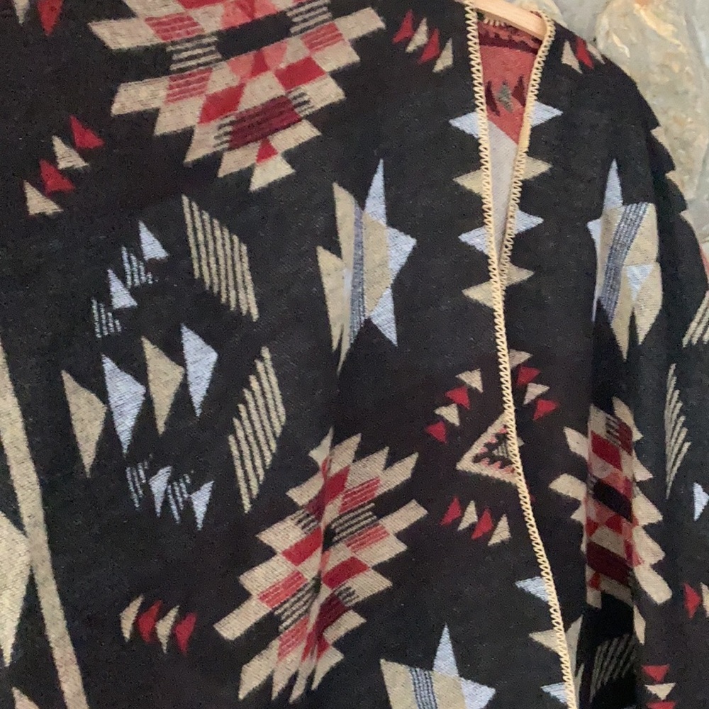 + Poncho + - Picture 2 of 2